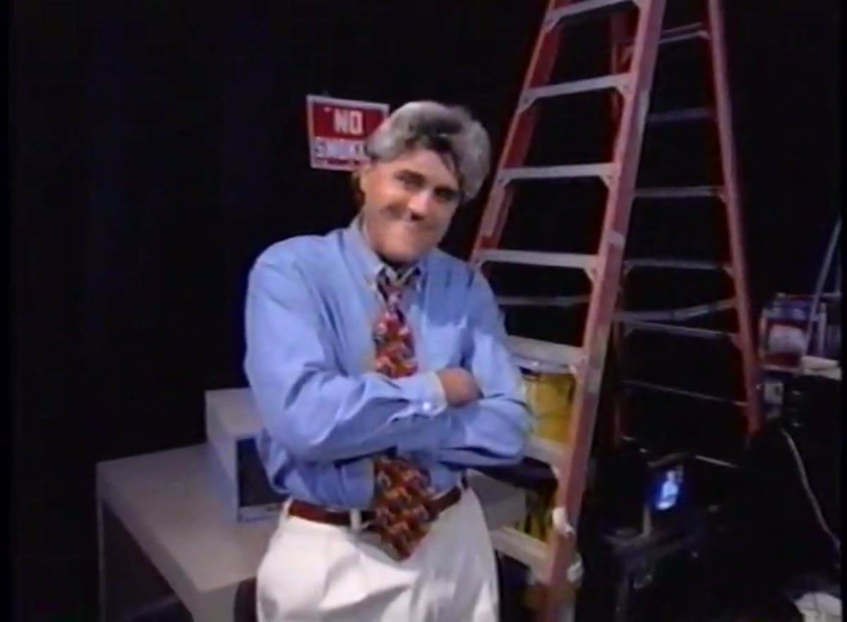 Bill Gates on stage at the Windows 95 launch event, with Jay Leno beside him.