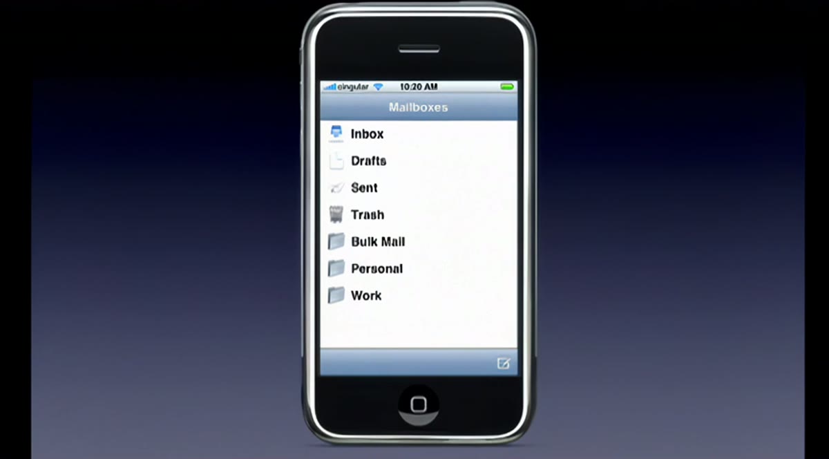 The iPhone's email inbox interface, displayed large on the keynote screen.