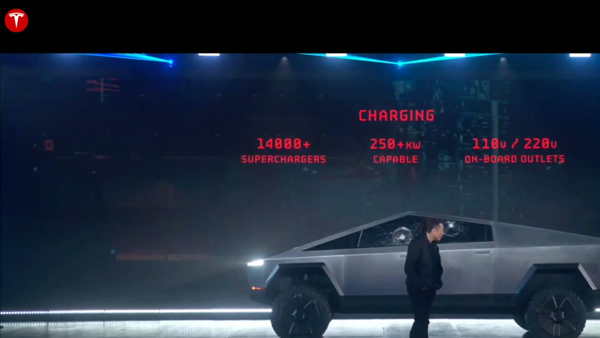 The Cybertruck on stage with an on-screen overlay showing charging specifications.